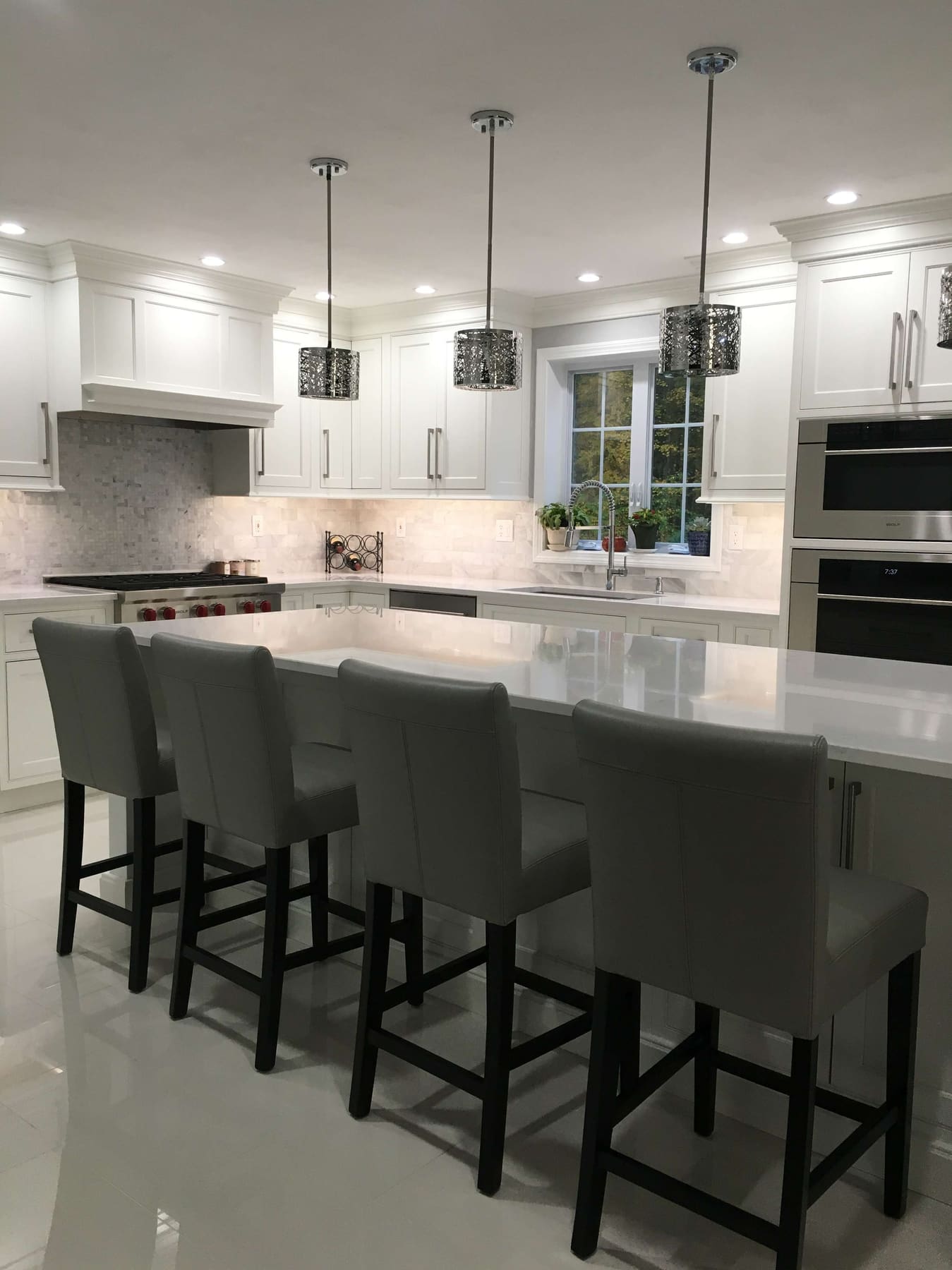 Before and after kitchen cabinetry remodel in Tyngsboro, Massachusetts