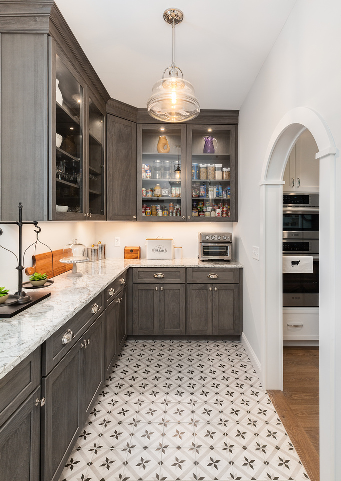 Walk-in pantry cabinetry with sink by Plaistow Cabinet